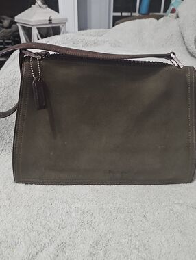 This is a vintage Coach Monterey Olive Green Suede Satchel with Brown Trim